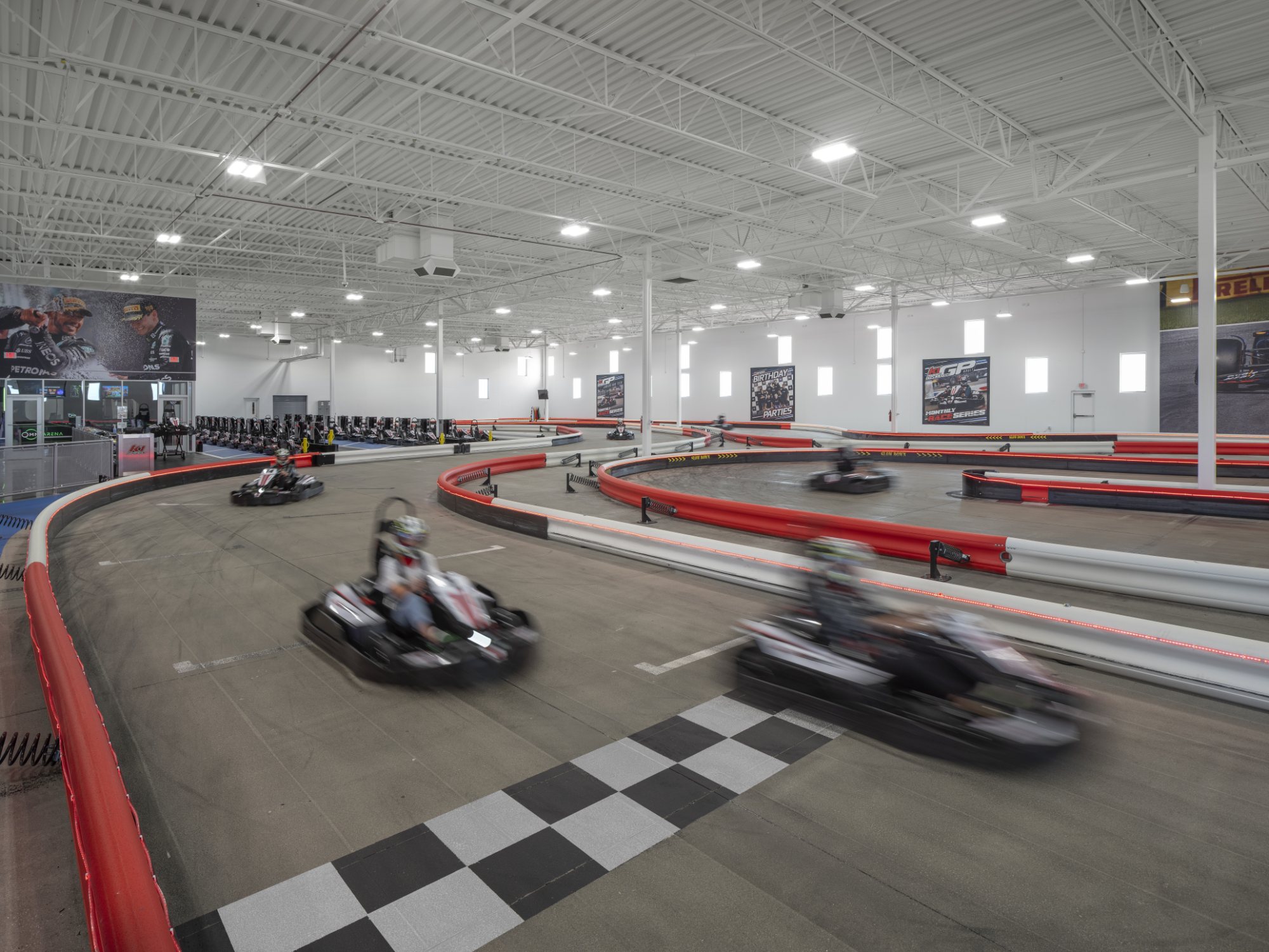Karts racing around the track
